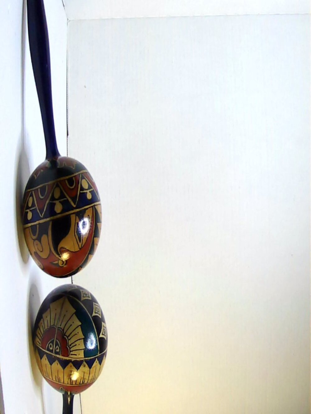Painted wooden maracas pair